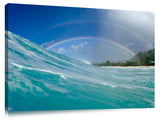 A rainbow over the surf at Pupukea, on the north shore of Oahu, Hawaii
