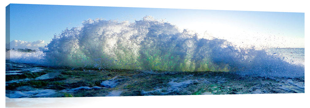 A wave crashng to shore at Sunset beach.