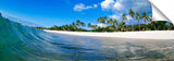 A wave washing onto the beach on the north shore.