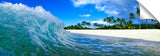A wave washing onto the beach on the north shore.