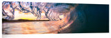 An ocean wave breaking onto the beach at Makena State Park, on the island of Maui in Hawaii.