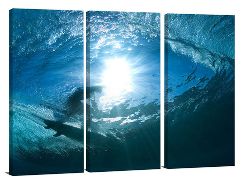 underwater view of surfing at Off The Wall, on Oahu's Nth shore.