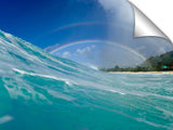 A rainbow over the surf at Pupukea, on the north shore of Oahu, Hawaii