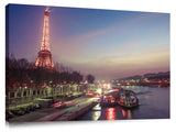Eiffel tower across the river Siene at dusk