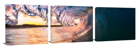 An ocean wave breaking onto the beach at Makena State Park, on the island of Maui in Hawaii.