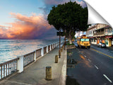 A school bus passing at Lahaina, on the island of Maui.