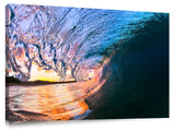 An ocean wave breaking onto the beach at Makena State Park, on the island of Maui in Hawaii.