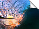 An ocean wave breaking onto the beach at Makena State Park, on the island of Maui in Hawaii.