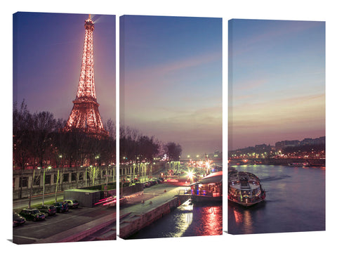 Eiffel tower across the river Siene at dusk