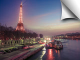 Eiffel tower across the river Siene at dusk
