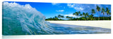 A wave washing onto the beach on the north shore.
