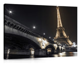 Eiffel tower at night over the river siene, Paris